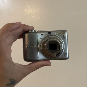 Canon PowerShot A1100 IS 12.1MP Digital Camera - Silver USED
